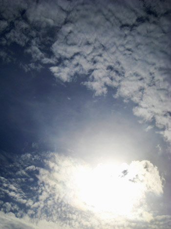 sun peeking through clouds