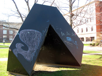 the “spitball” statue at case western reserve university, covered in chalk drawings.