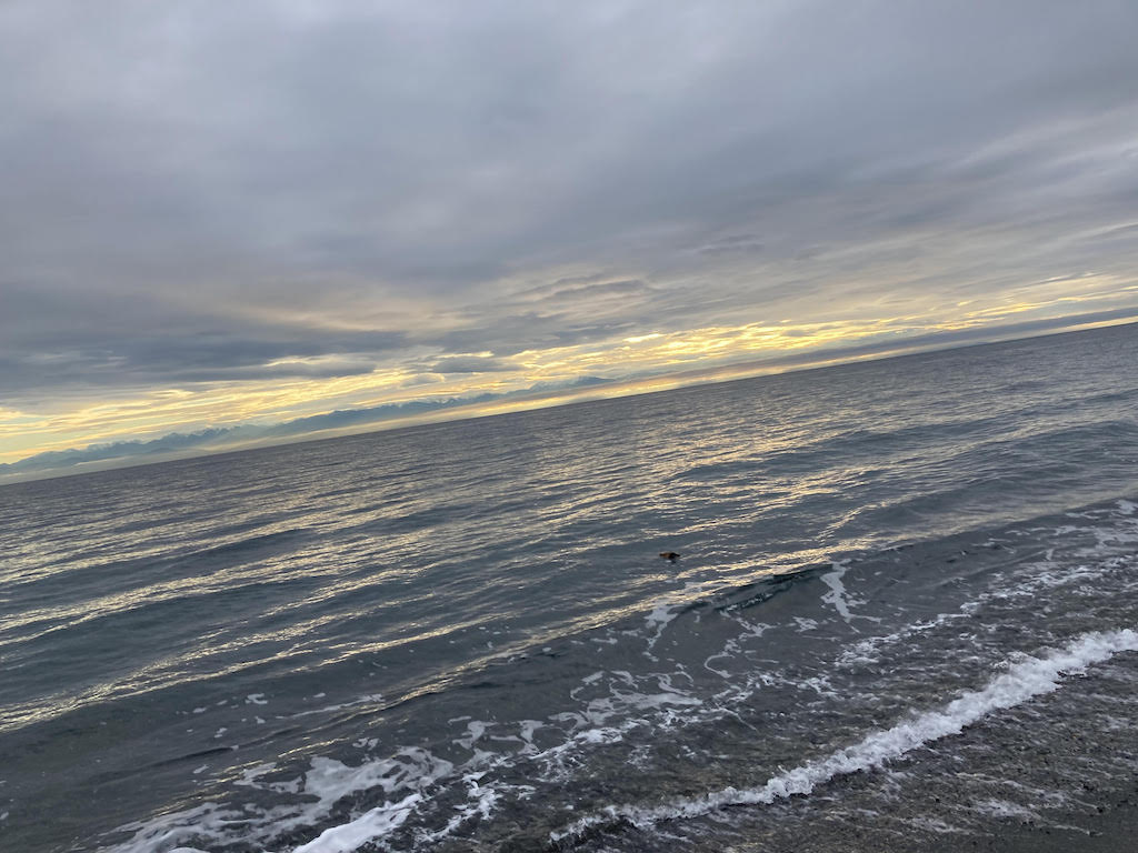 Image of a sunset over the water