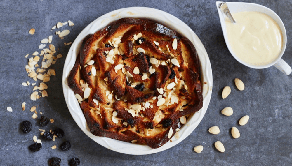 Sour Cherry Bread and Almond Butter Pudding, slathered in hot vanilla custard is a perfect British winter comfort food.