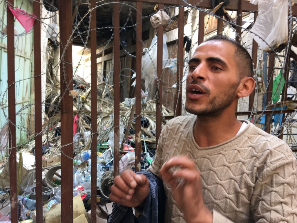 Izzat speaks at one of the closed-off streets