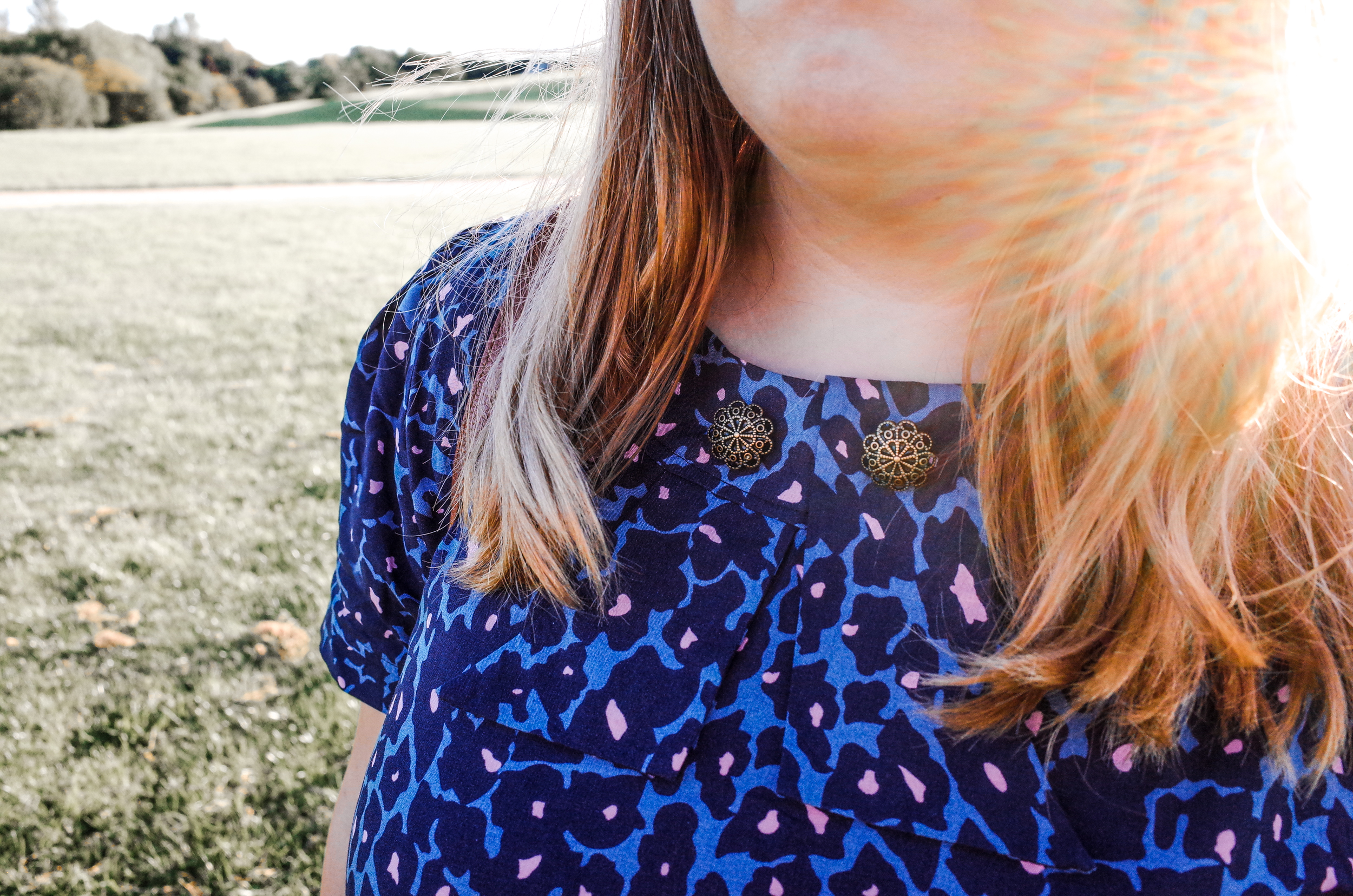 A close up of Joe Brown's Touch Of Pink dress, with a pretty patterned collar