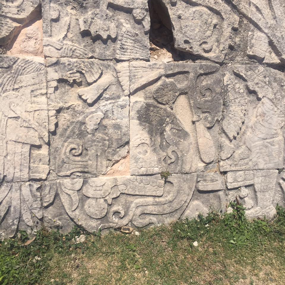 Formidable Joy - UK Fashion, Beauty & Lifestyle Blog | Travel | My Mexican Adventure | Day One - Chichen Itza & Merida More carvings in a stone wall in Chichen Itza, decapitating different faces and stories.
