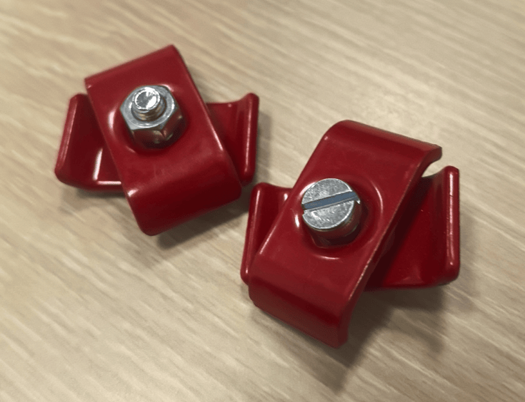 Powder-coated gridwall panel connectors used to join grid panels into L, U or island configurations - Formost