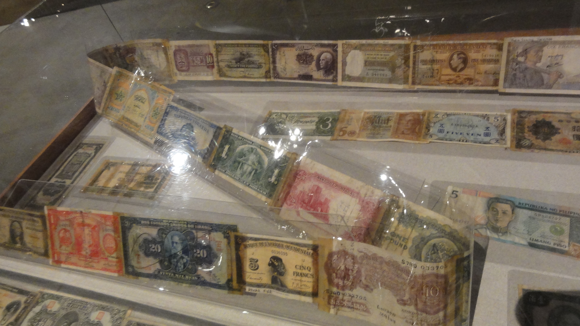 I thought this was neat too: Airmen would collect currency from different places they had flown, tape them together, and then when they'd go out to a bar, they'd pull them out and compare them and the guy with the shortest "short snorter" had to buy the drinks.