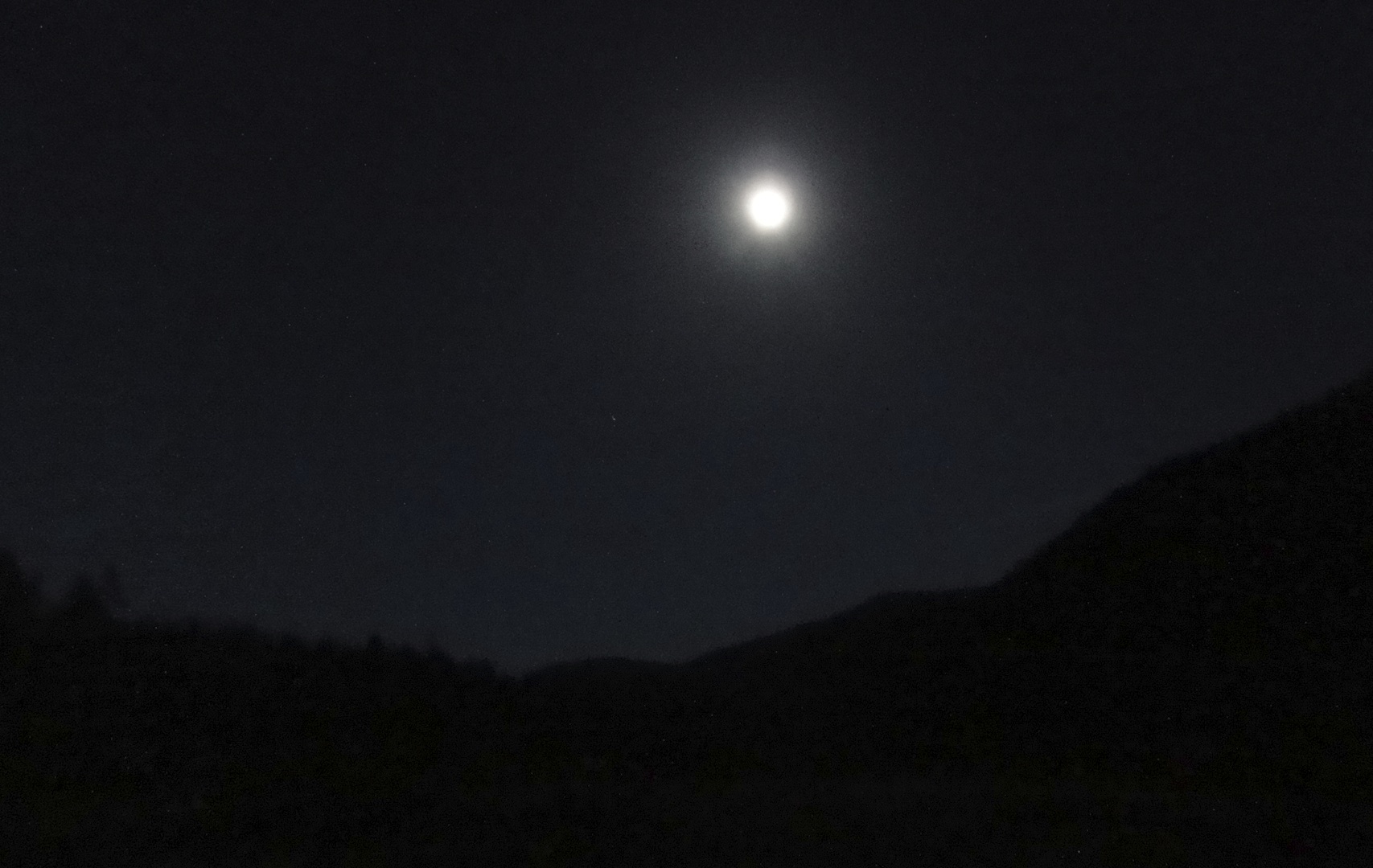 We were at our campsite in the Rockies on the longest day of the year, which also happened to fall during a brilliant full moon. We barely needed headlamps.