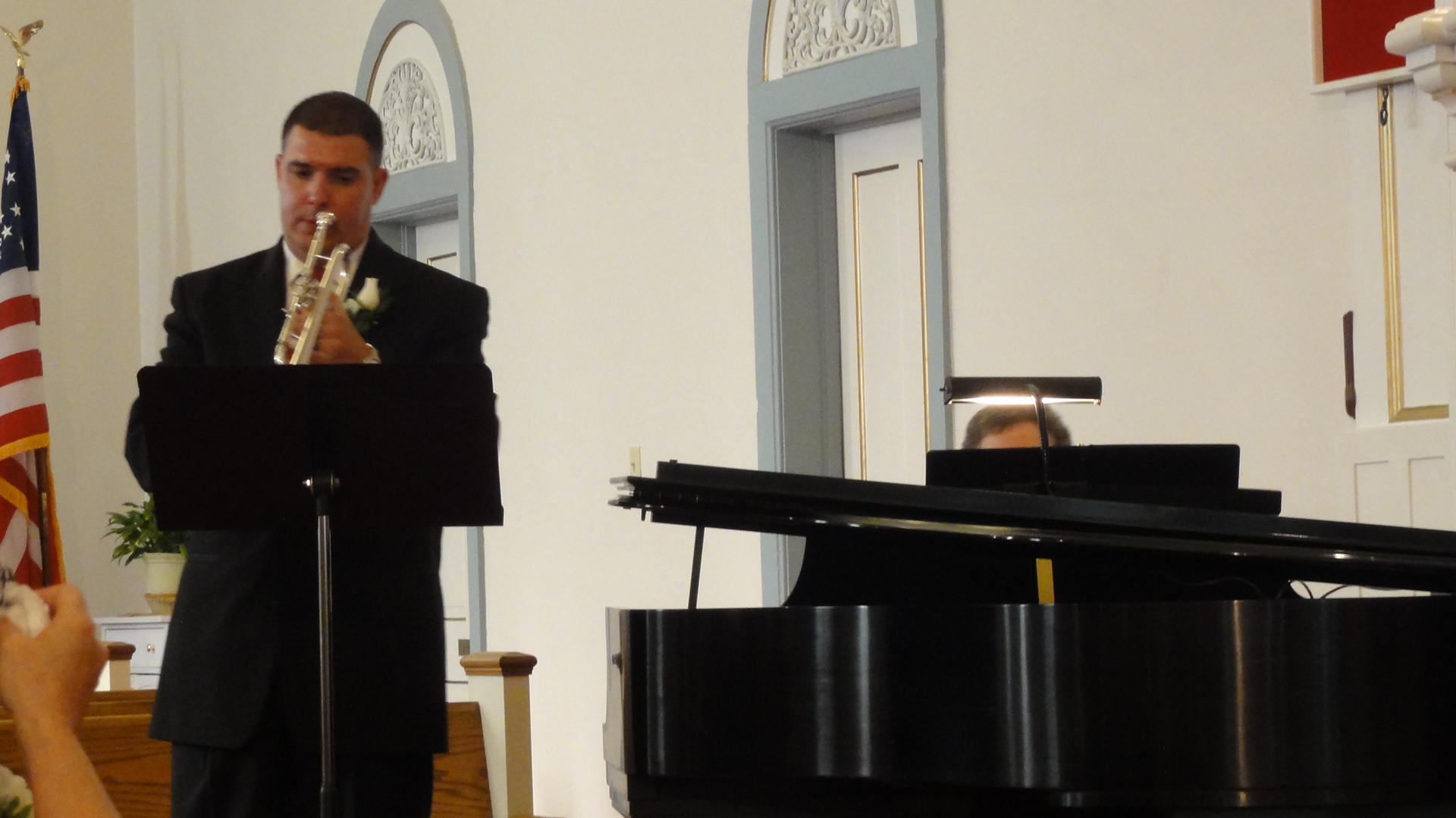 My talented cousin Andy arranged the music for the wedding and played trumpet while also serving as a groomsman.