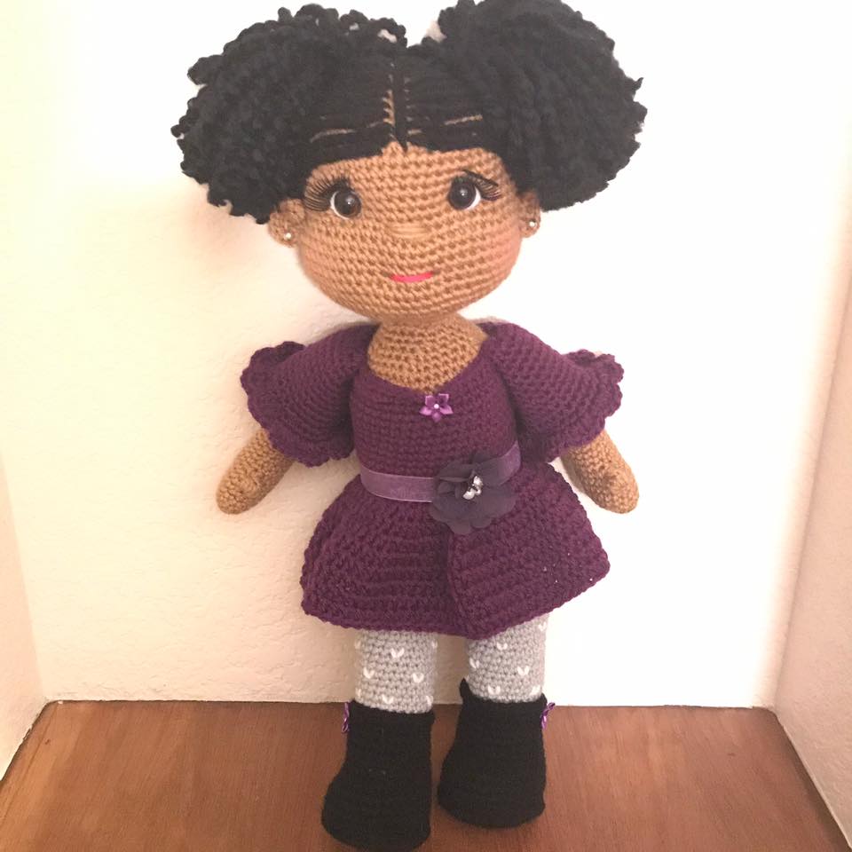 She has cornrows and ponytails