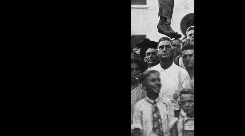 Detail from the cover of 'Without Sanctuary: Lynching Photography in America' by James Allen.