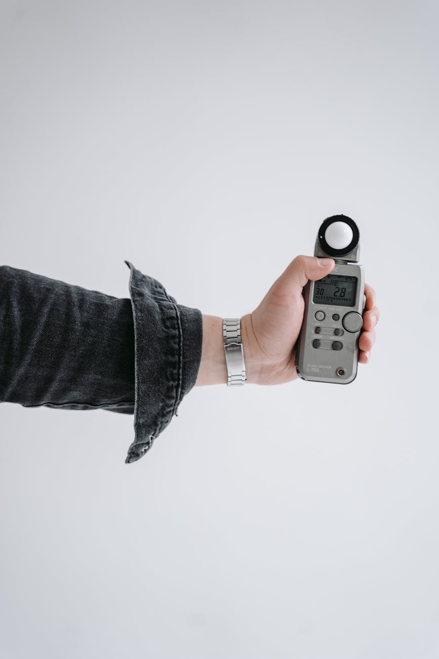 person hand camera wristwatch