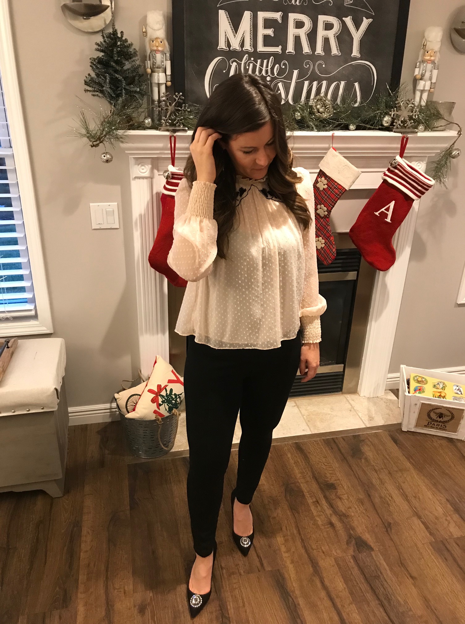 Modeling black leggings from Cabi