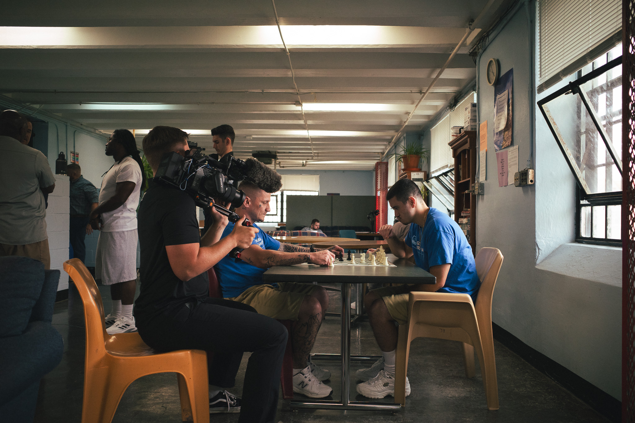 playing chess Behind the scenes, two residents are playing chess.
