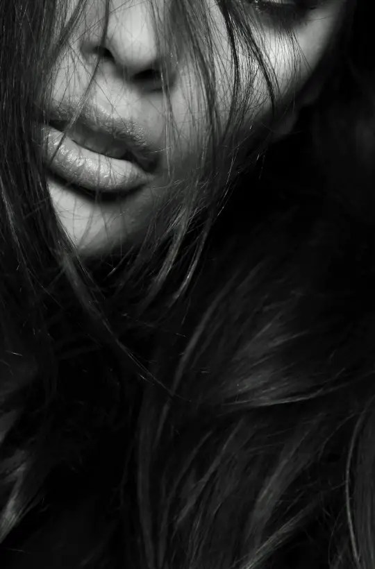 Black and white close-up of a woman's face