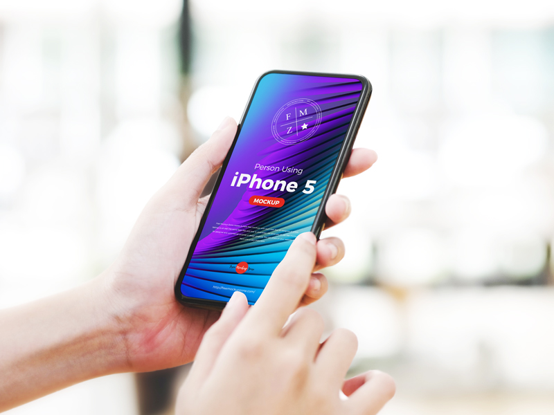 It also includes smart objects for adding your own screenshots to the phones. Free Person Using Iphone 5 Mockup Free Mockup Zonefree Mockup Zone