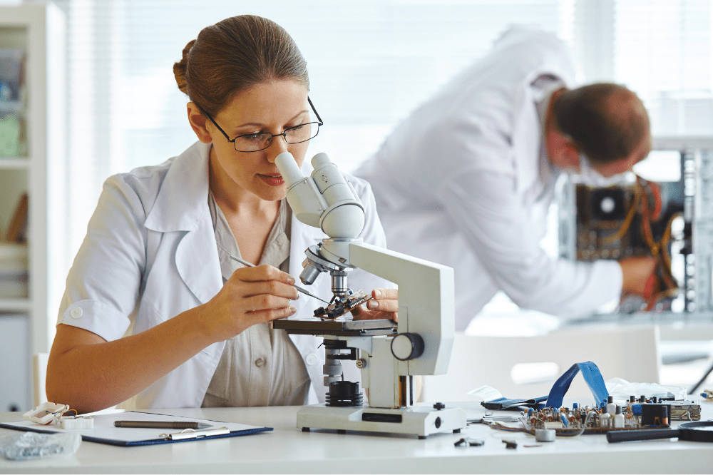 scientist with microscope
