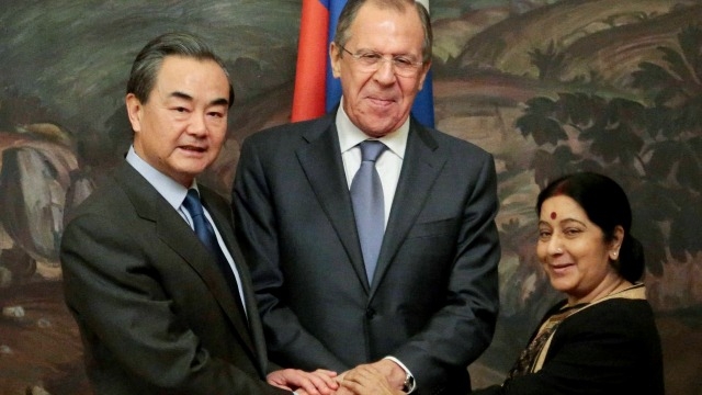 Chinese Foreign Minister Wang Yi, Russian Foreign Minister Sergei Lavrov and Indian Foreign Minister Sushma Swaraj pose before their meeting in Moscow, Russia, (PTI)