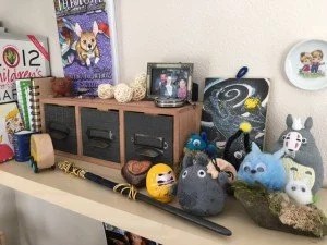 My Ravenclaw Wand Found a Happy Home on my Knick-Knack Shelf. Photo Credit: J.H. Winter