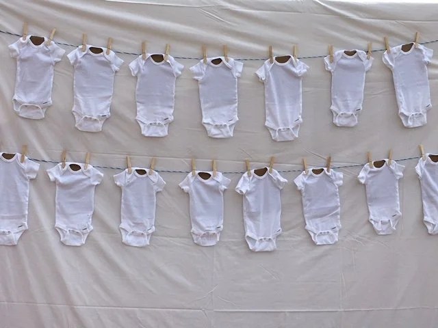 Blank Onesies Needing Some Inspiration. Photo Credit: J.H. Winter