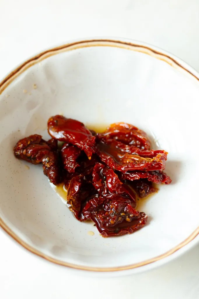 sun-dried tomatoes in a white bowl