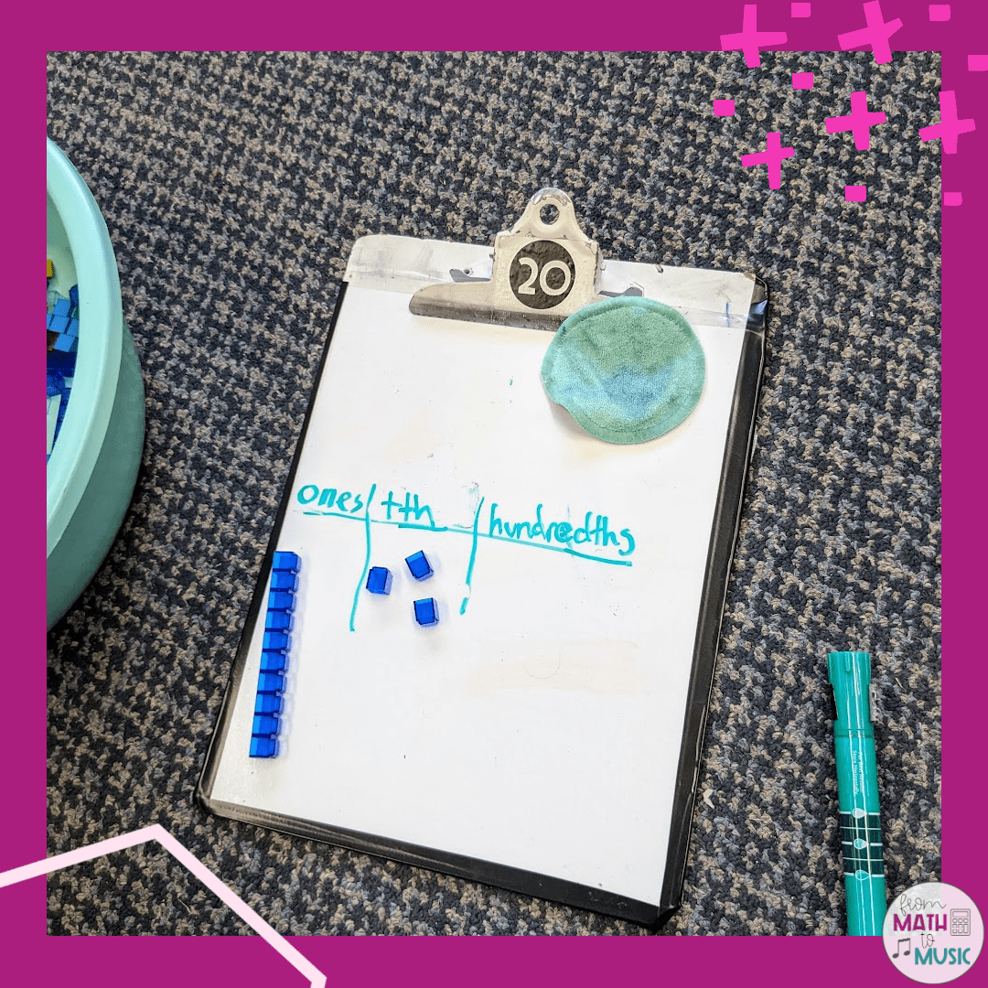 clipboard with math manipulatives