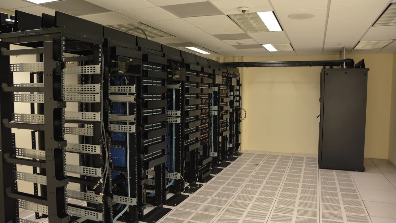 Data center server racks powering large AI models