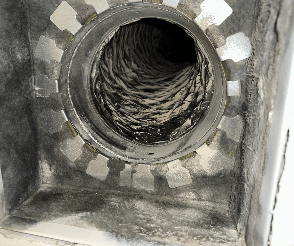 Air duct with visible dust accumulation