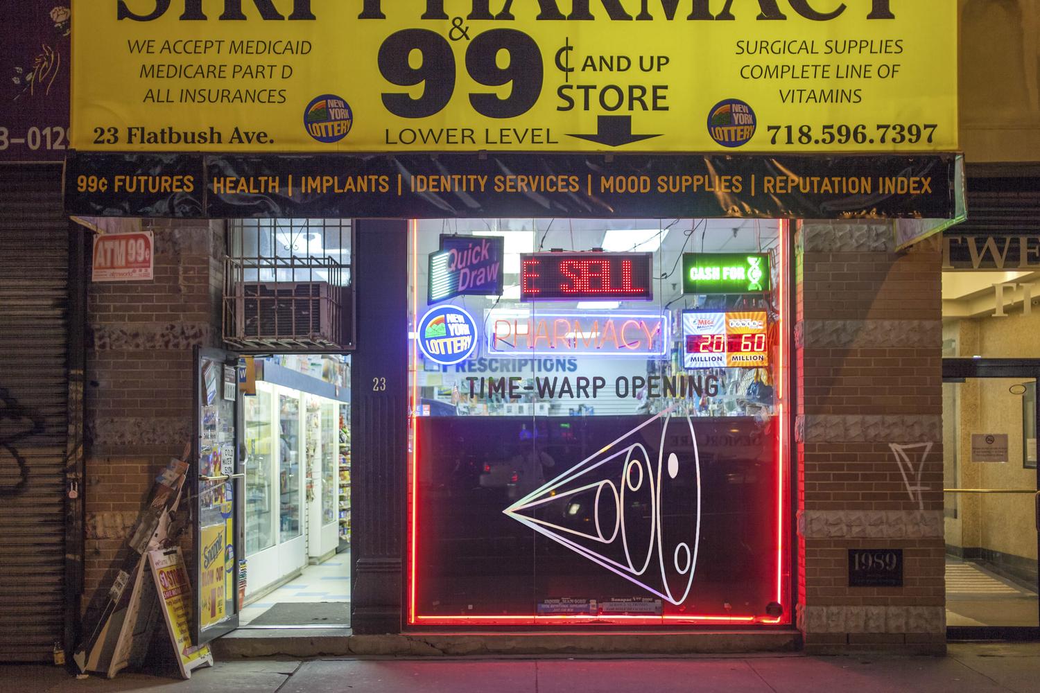 Window of a 99c store showing the Time Warp Sale sign