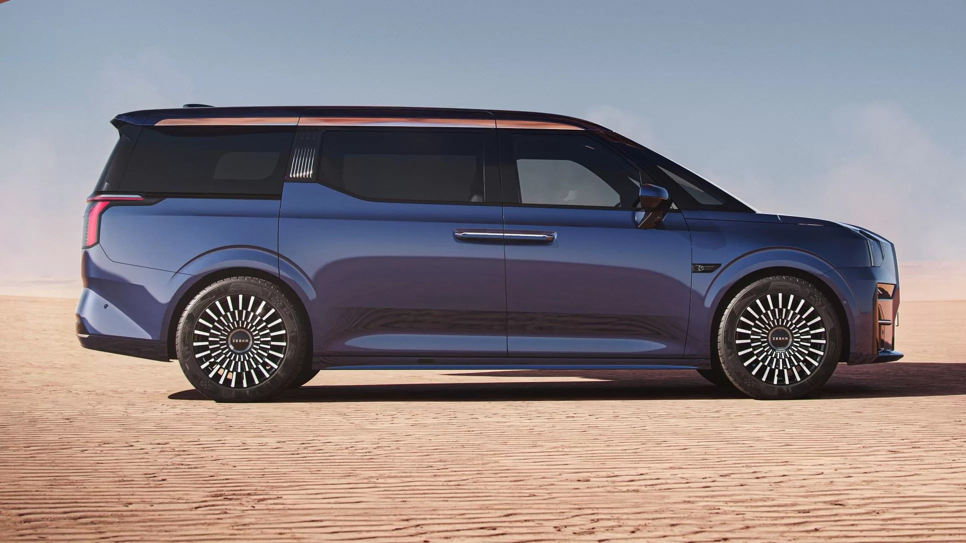 Zeekr 009 MPV on the sand.