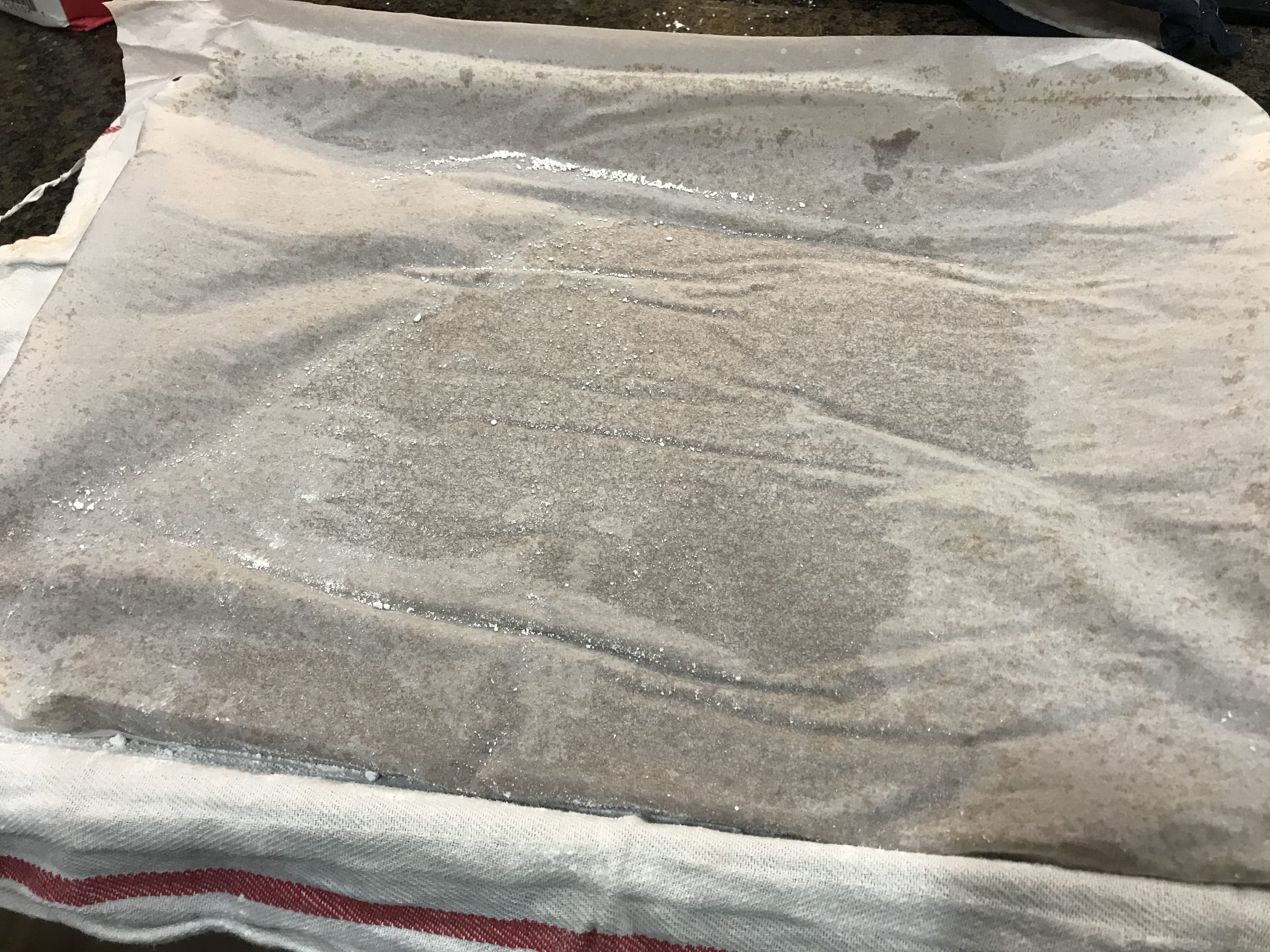 Gingerbread Cake inverted onto a tea towel