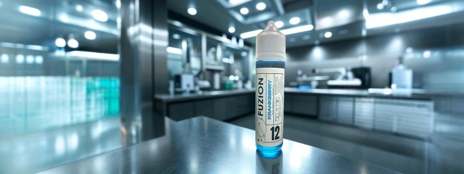 A bottle labeled "Fuzion Krankberry" containing blue liquid, placed on a shiny metal counter in a modern laboratory setting.