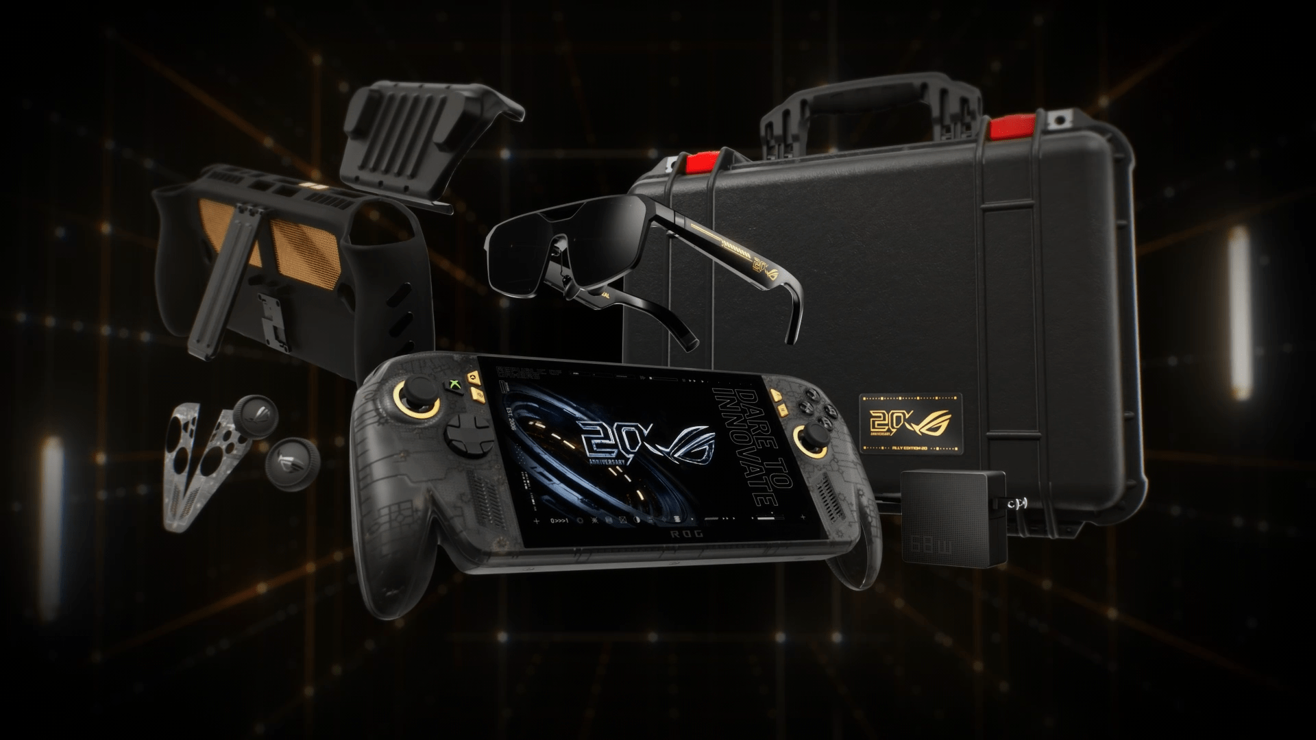 ROG XBOX Ally X20 gaming handheld with AR glasses, protective case, charger, controller grips, and custom dbrand accessories in a black-and-gold 20th anniversary bundle.