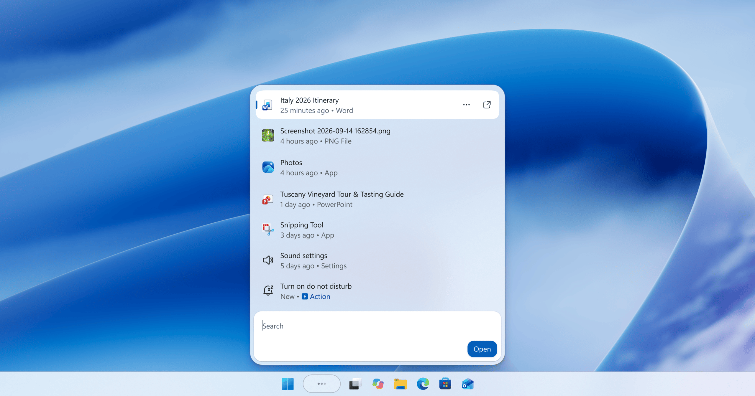 Redesigned Windows Search interface showing recent files, apps, settings, and a search box above the Windows 11 taskbar.