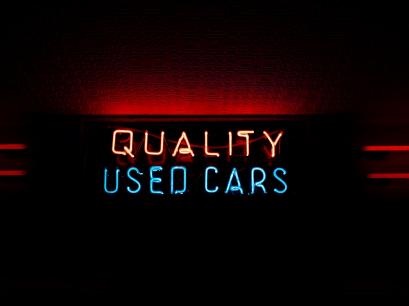 Quality used cars sign