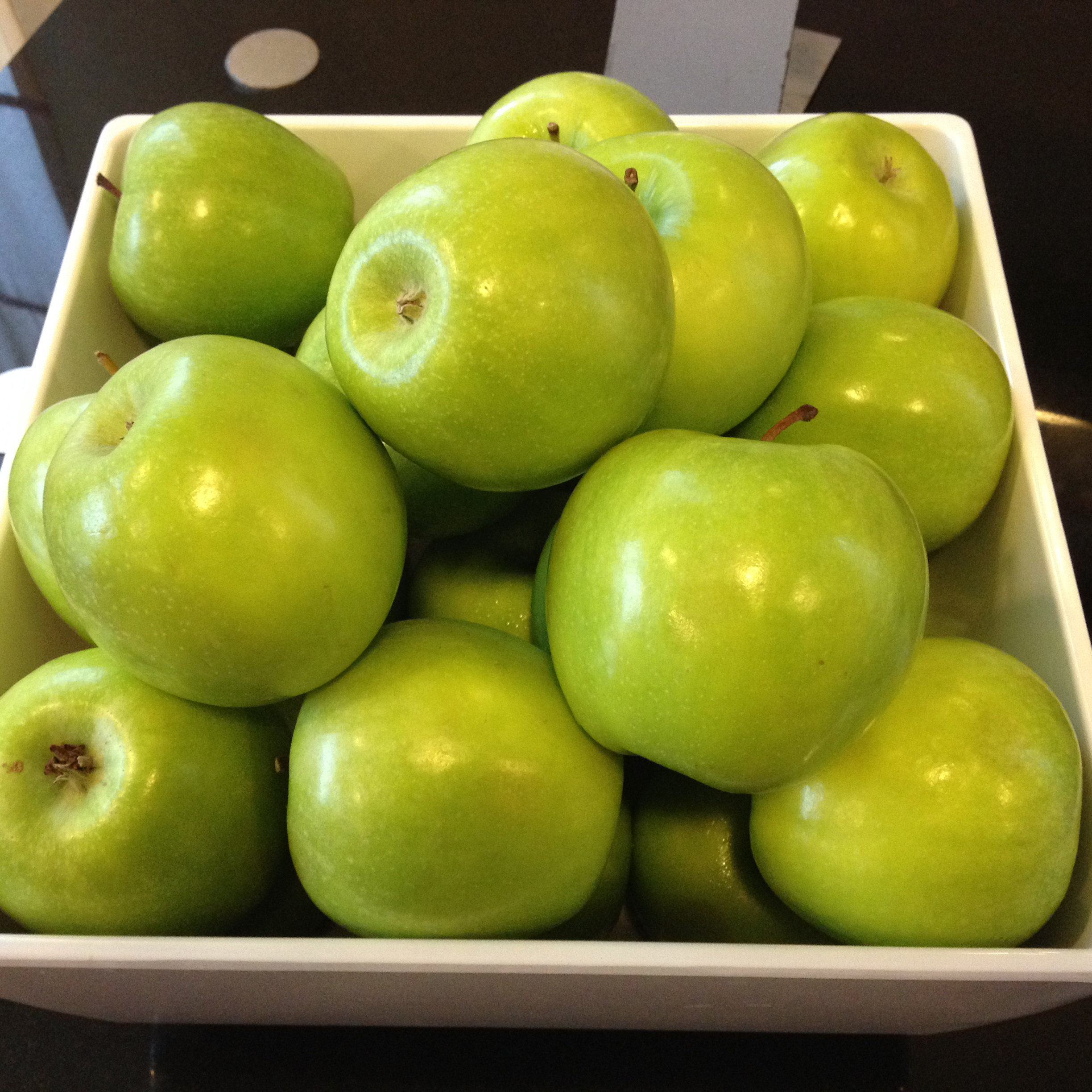 box of green apples