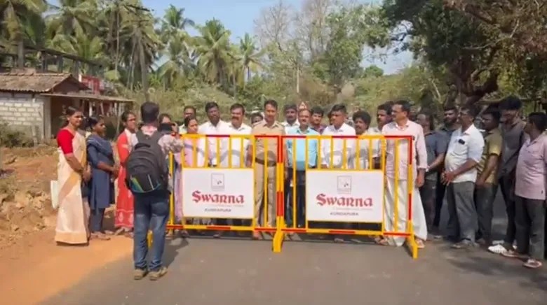 Gujjadi: Swarna Jewellers Donates 8 Barricades to Gram Panchayat for Traffic Safety