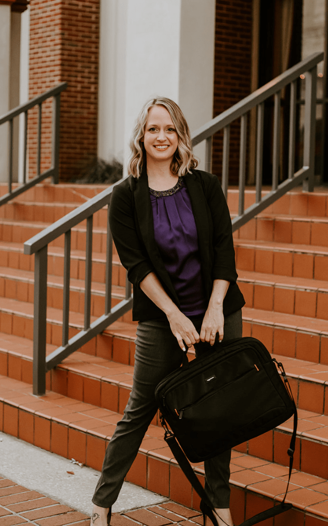 Co-Owner of Gap Science Ashley Church in business attire