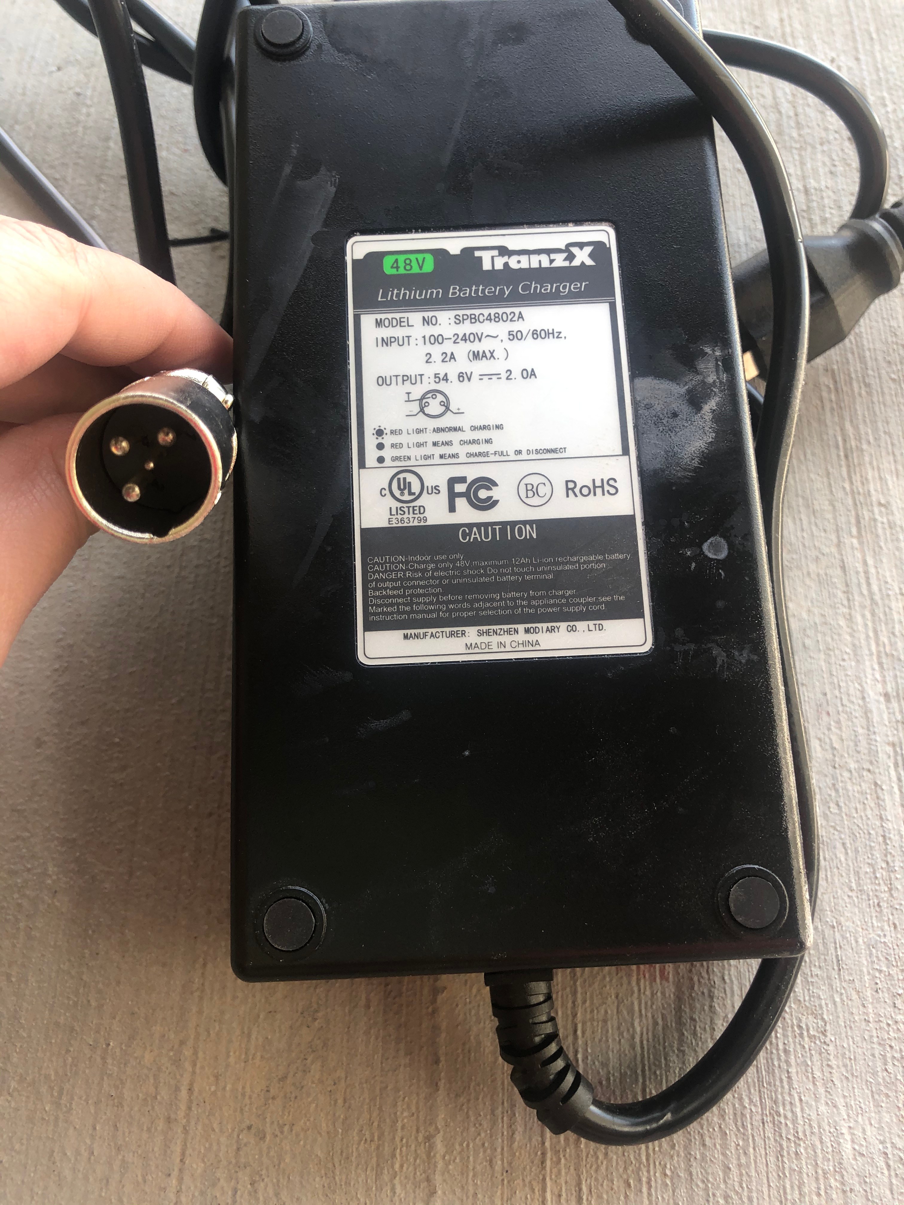 New Tranz-X Charger 48V 2A Li-Ion – Gary's Bikes