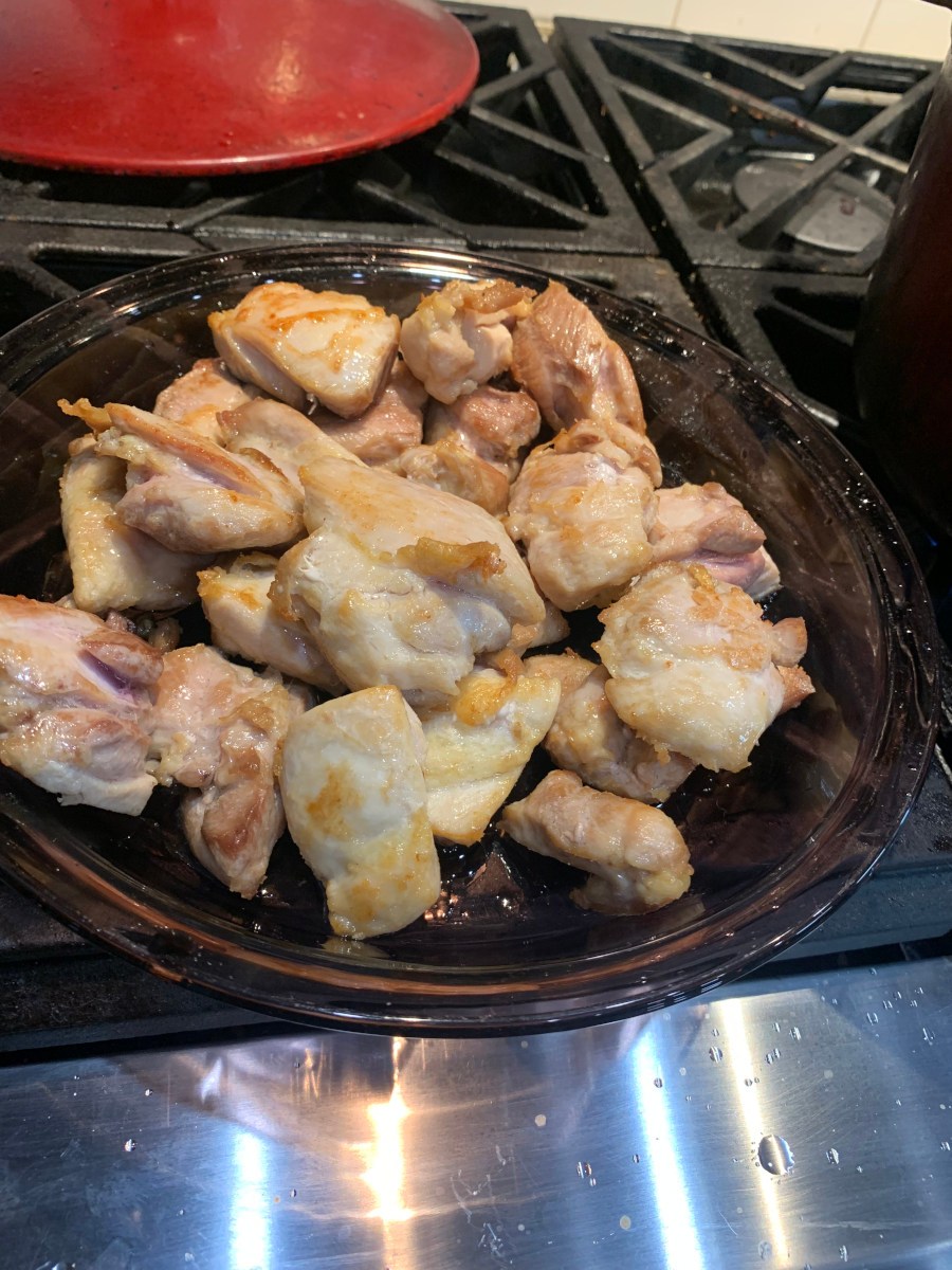 Chicken Gumbo - browned chicken pieces in a glass dish