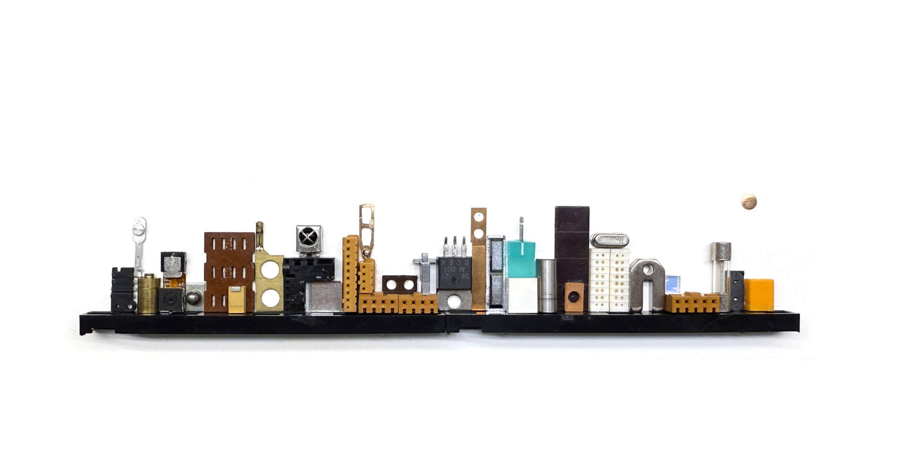 Art resembling a city skyline made with upcycled parts by Dan Perkins