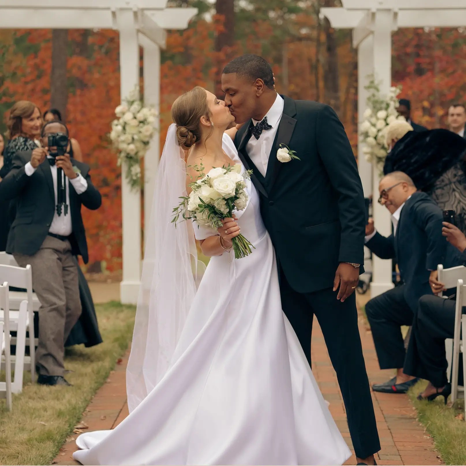 Bride and Groom kissing at Brier Creek Country Club Wedding Venue