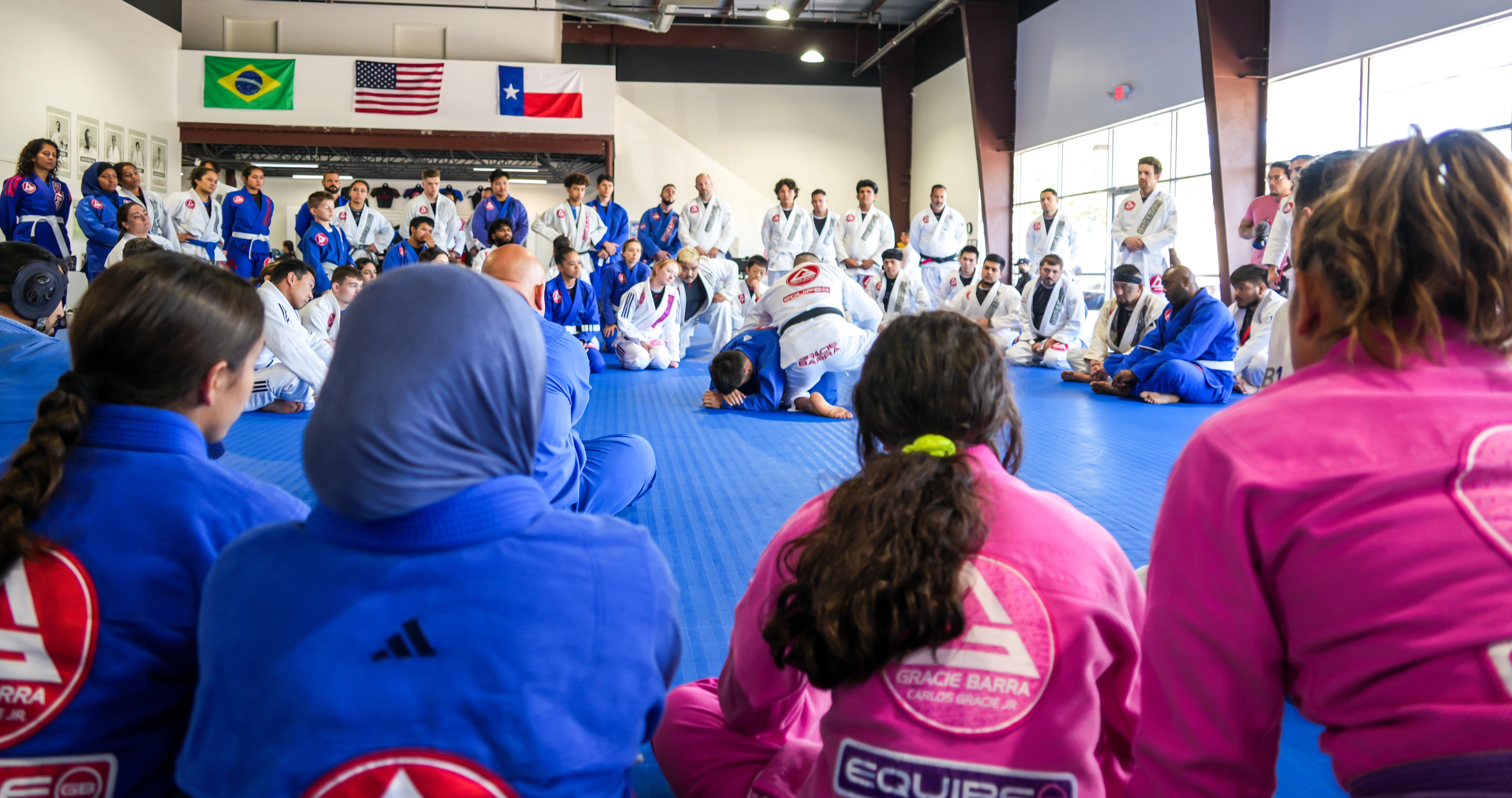 gracie barra richmond texas bjj school, black belt teaching a side control technique
