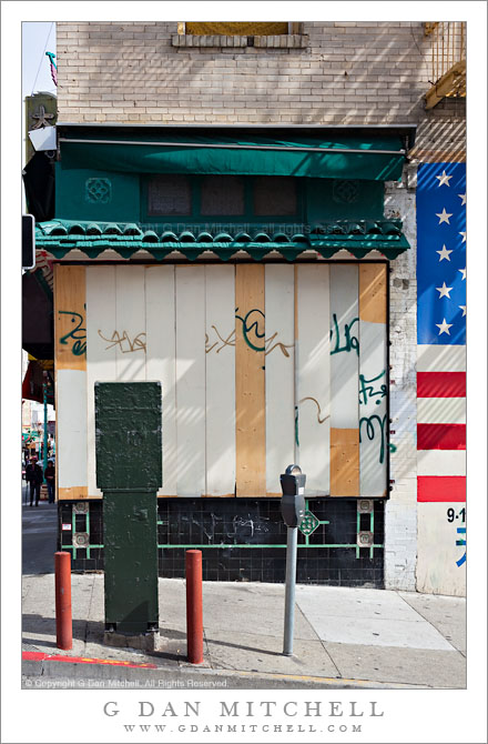 Corner Store With Boarded-Up Windows