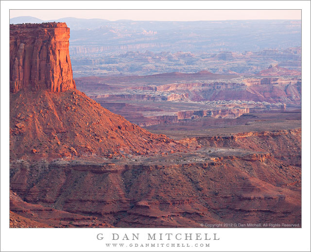 Murphy Point and Murphy Hogback, Evening - Evening light on the brow of Murphy Point, with Murphy Hogback leading to the right and the areas of the Green and Colorado Rivers confluence and the Needles beyond, Canyonlands National Park.
