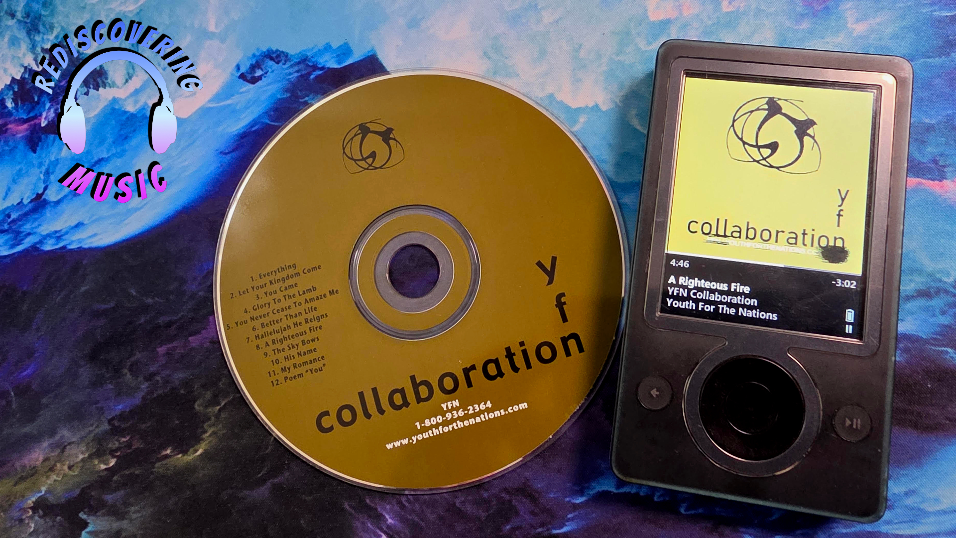 YFN Collaboration CD from 2002 next to a black MP3 player showing the album, with the Rediscovering Music headphones logo