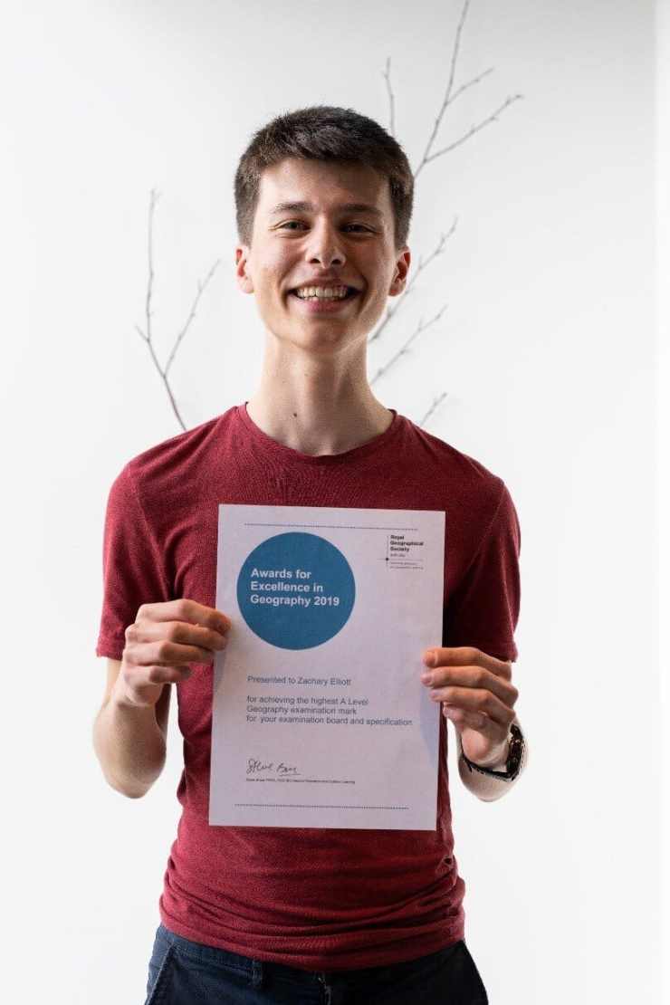 Remember summer 2019? - Ah, that seems like it was 100 years ago now, doesn't it? Well, this week it was announced that former Castle Rushen student Zachary Elliott earned a big award for his efforts in his A-Level exams summer. Zachary was awarded the Royal Geographical Society Excellence Award for his Cambridge International A-Level Geography exam where he achieved the highest mark IN THE WORLD. Zachary, who now studies Geography at Oxford (no surprise there) was joined in his success by CRHS teacher Emma Metcalfe who received an Ordnance Survey Award from the society for excellence in Geography teaching in secondary education back in May.