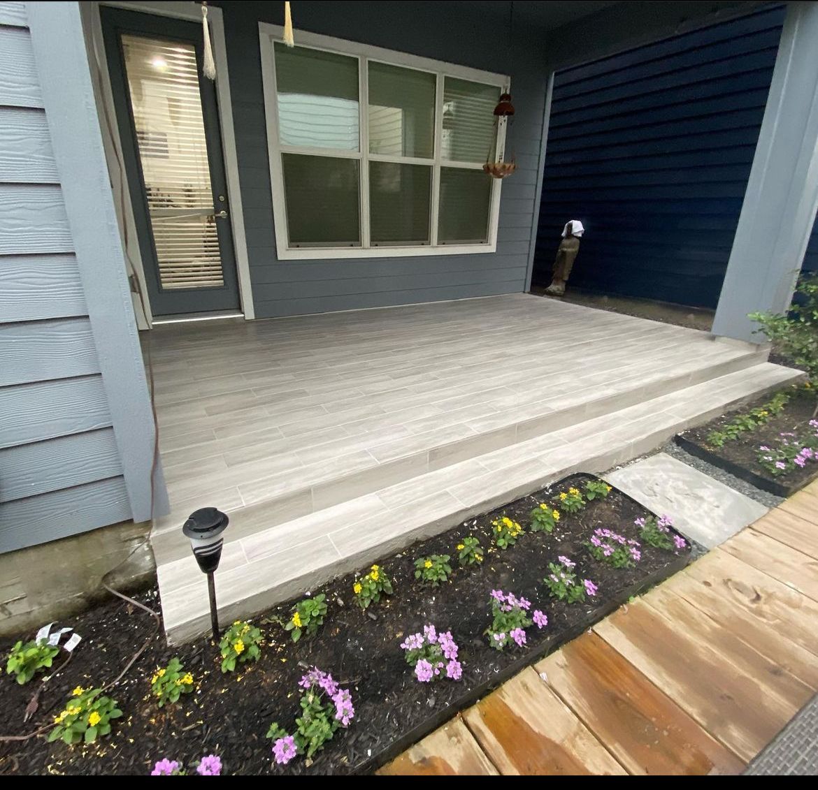 Installation of tile like wood on patio, The Heights