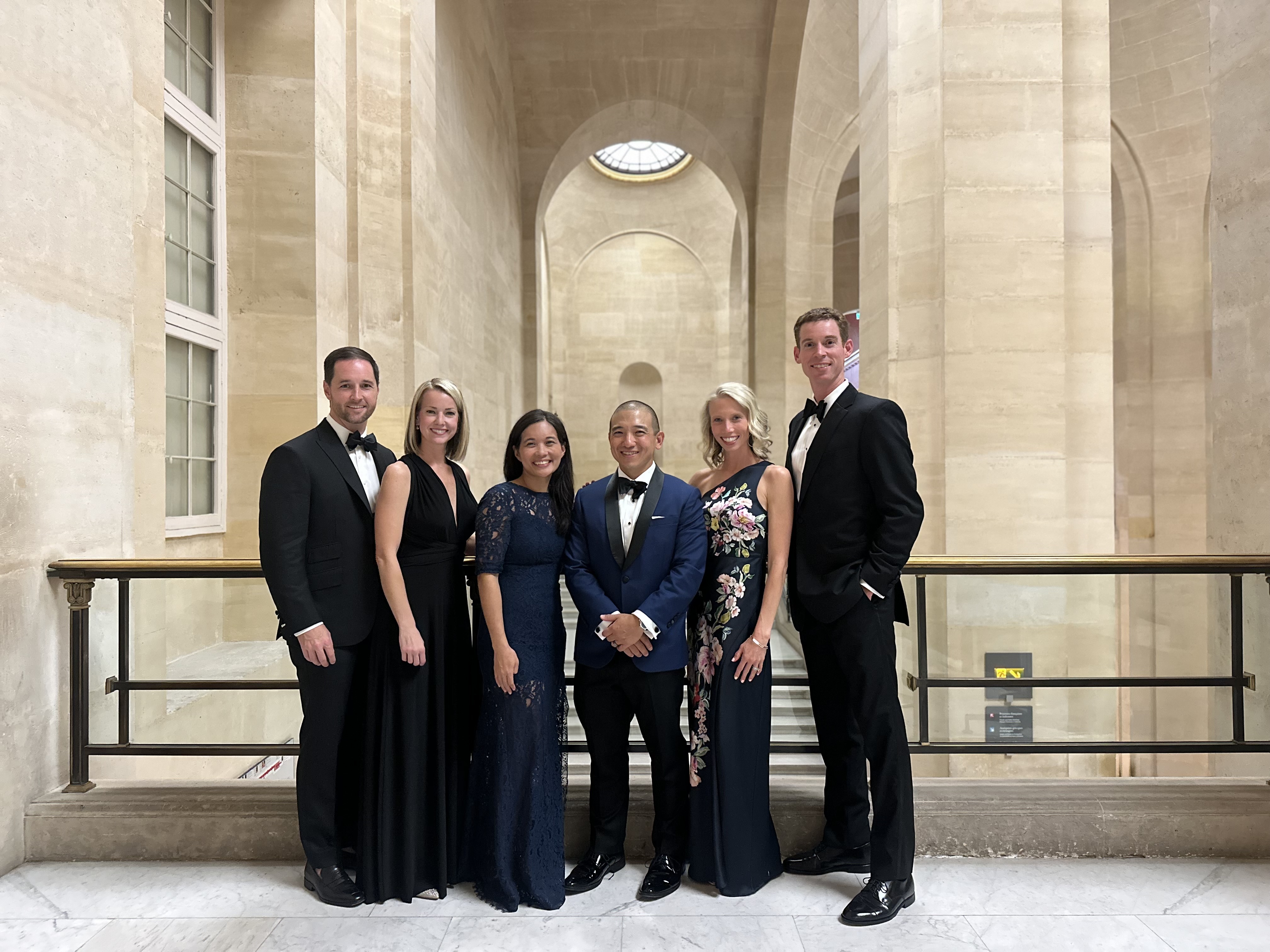 Daniel, Ben and Nolan with their spouses at a black tie event