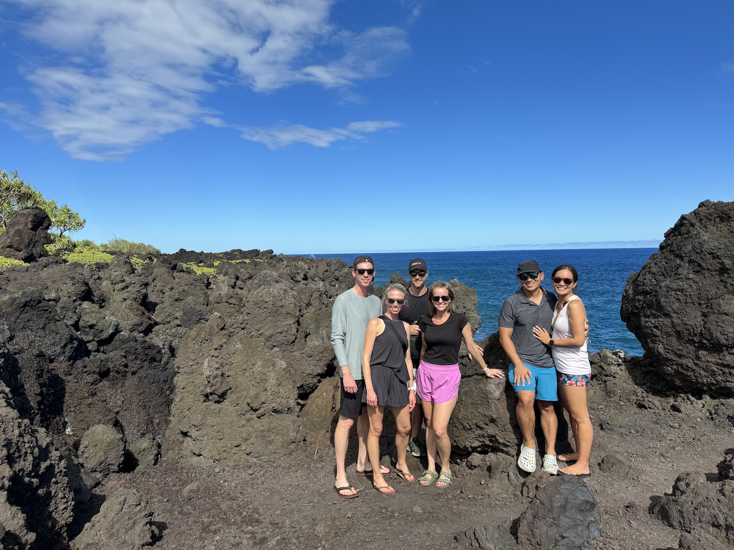 Nolan, Daniel and Ben with their spouses on a beach