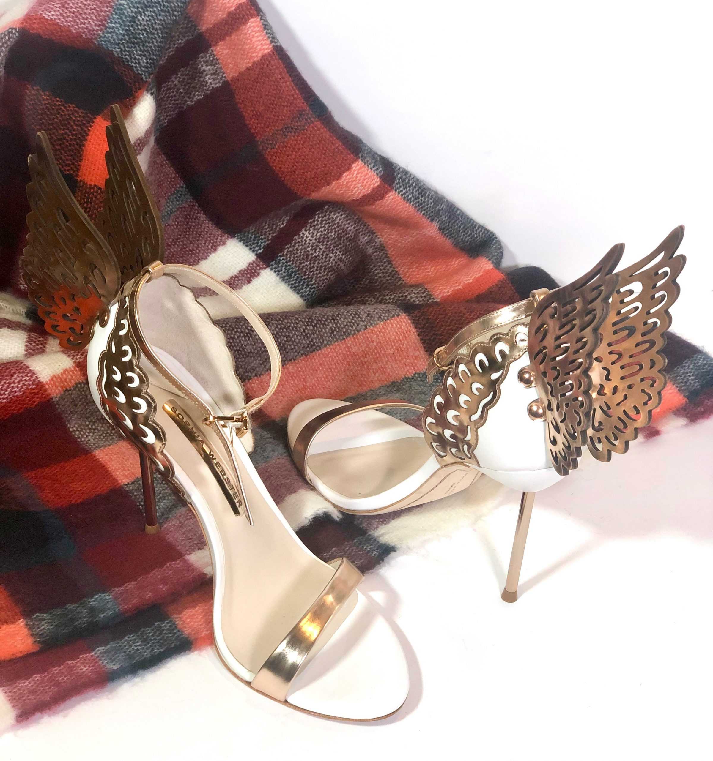Display of Sophia Webster Evangeline Sandals along with plaid scarf