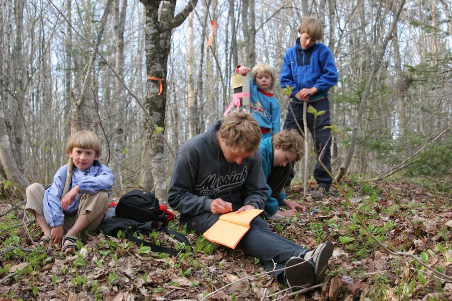 Signing a logbook.